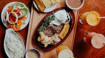 sliced bread on brown wooden chopping board